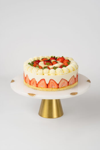 Delicious Strawberry Shortcake (NUT FREE) featuring layers of fluffy cake, fresh strawberries, and creamy whipped topping.